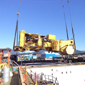 Global relocation project of Komatsu 830E, truck body being unloaded from cargo ship
