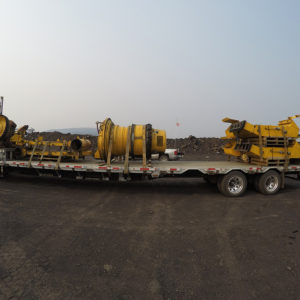 Global relocation project of Komatsu 830E, front and rear wheel group