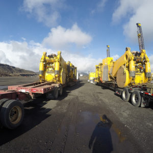 Global relocation project of Komatsu 830E, haul truck components on transport truck