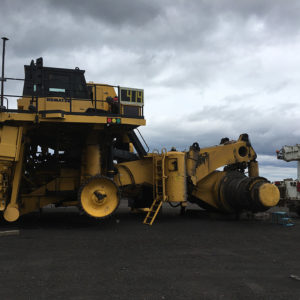 Global relocation project of Komatsu 830E, haul truck with front and rear wheel group