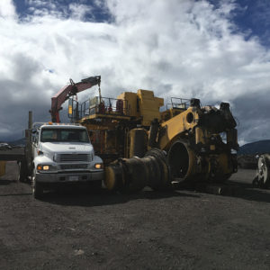 Global relocation project of Komatsu 830E, haul truck and rear wheel group