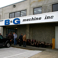 old workshop exterior with B&G Machine Inc logo