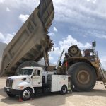 H-E Parts field service truck on site completing repairs to CAT 795F