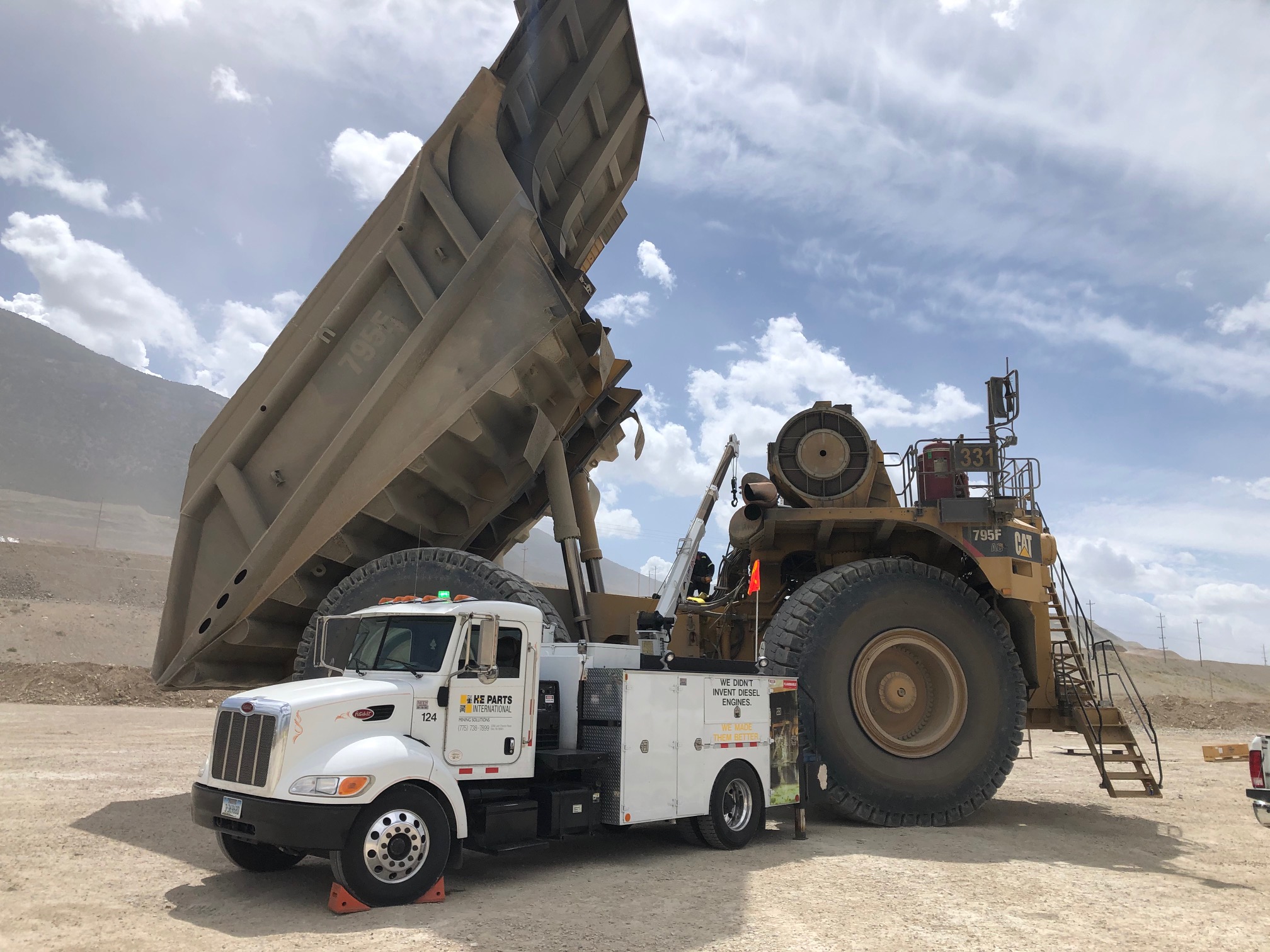 H-E Parts field service truck on site completing repairs to CAT 795F